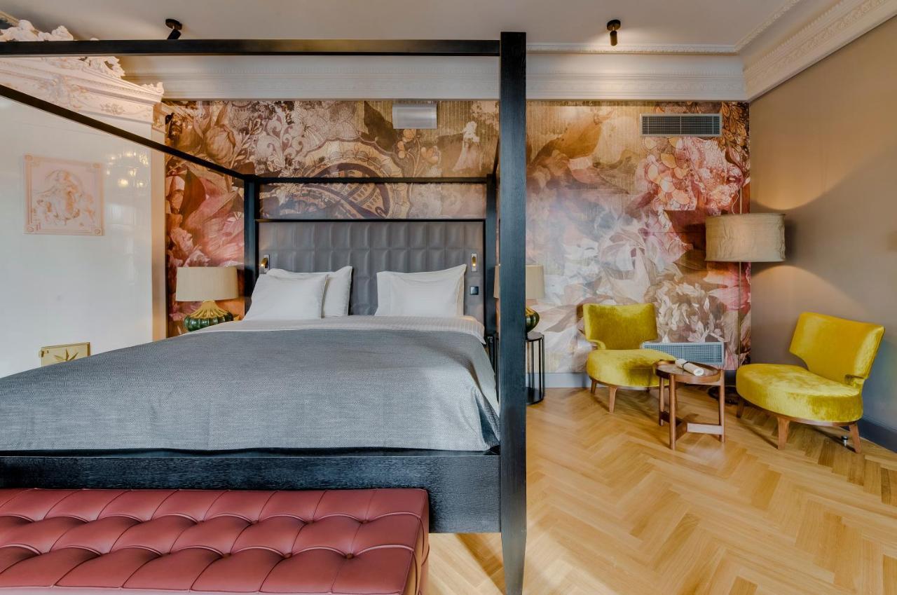 Grand Poet Hotel And Spa By Semarah Riga Bagian luar foto A suite at the hotel