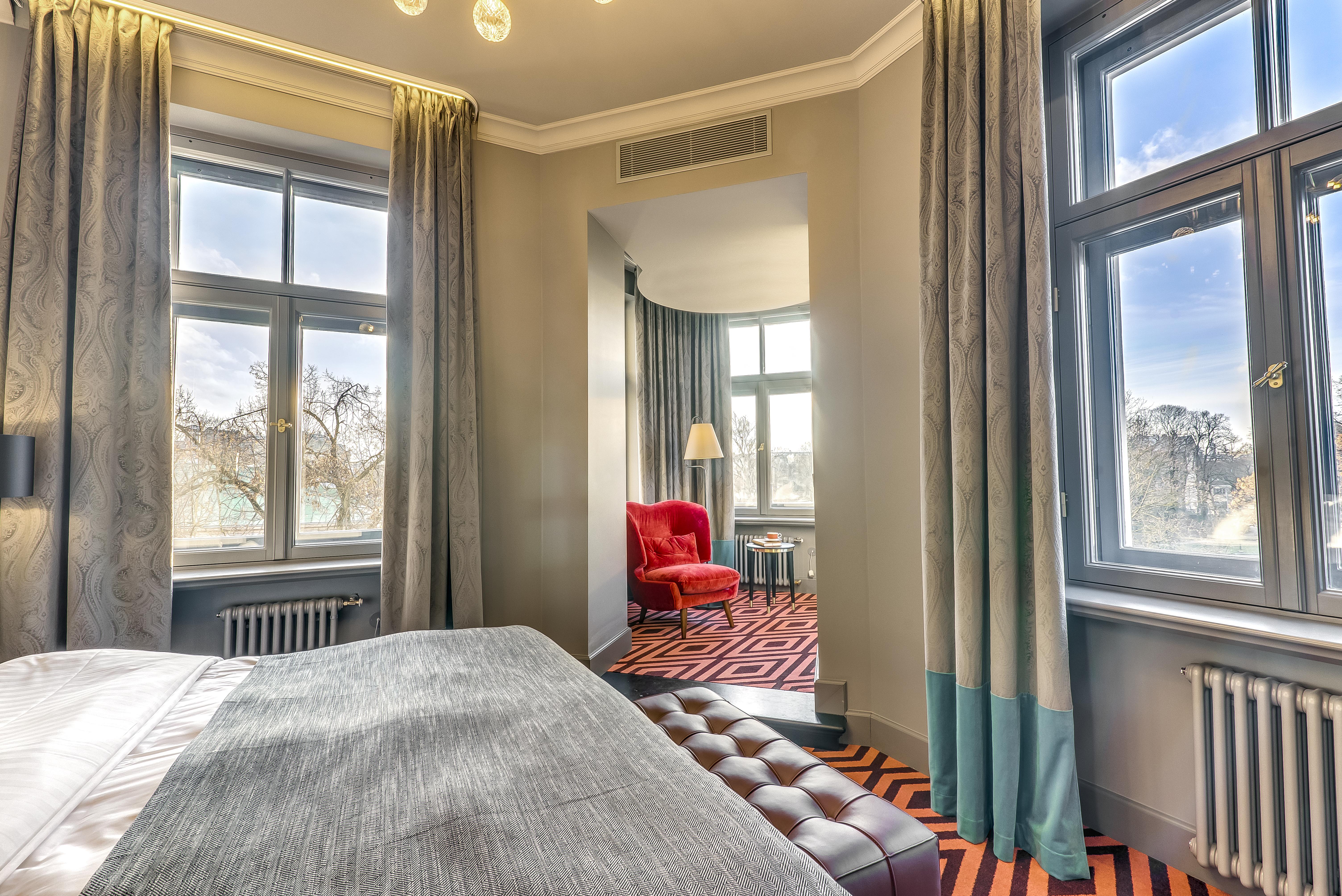 Grand Poet Hotel And Spa By Semarah Riga Bagian luar foto A room at the hotel