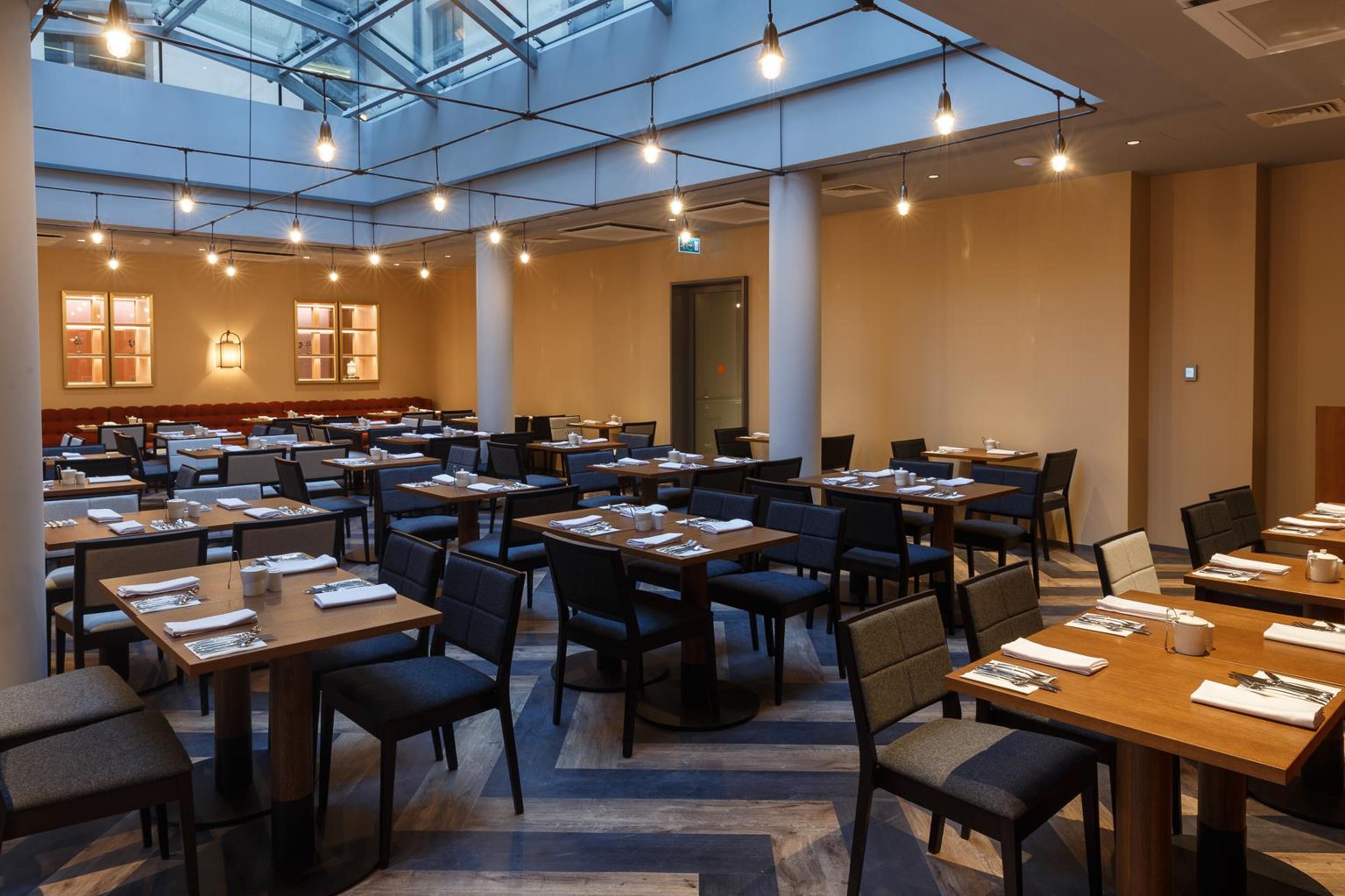 Grand Poet Hotel And Spa By Semarah Riga Bagian luar foto The restaurant