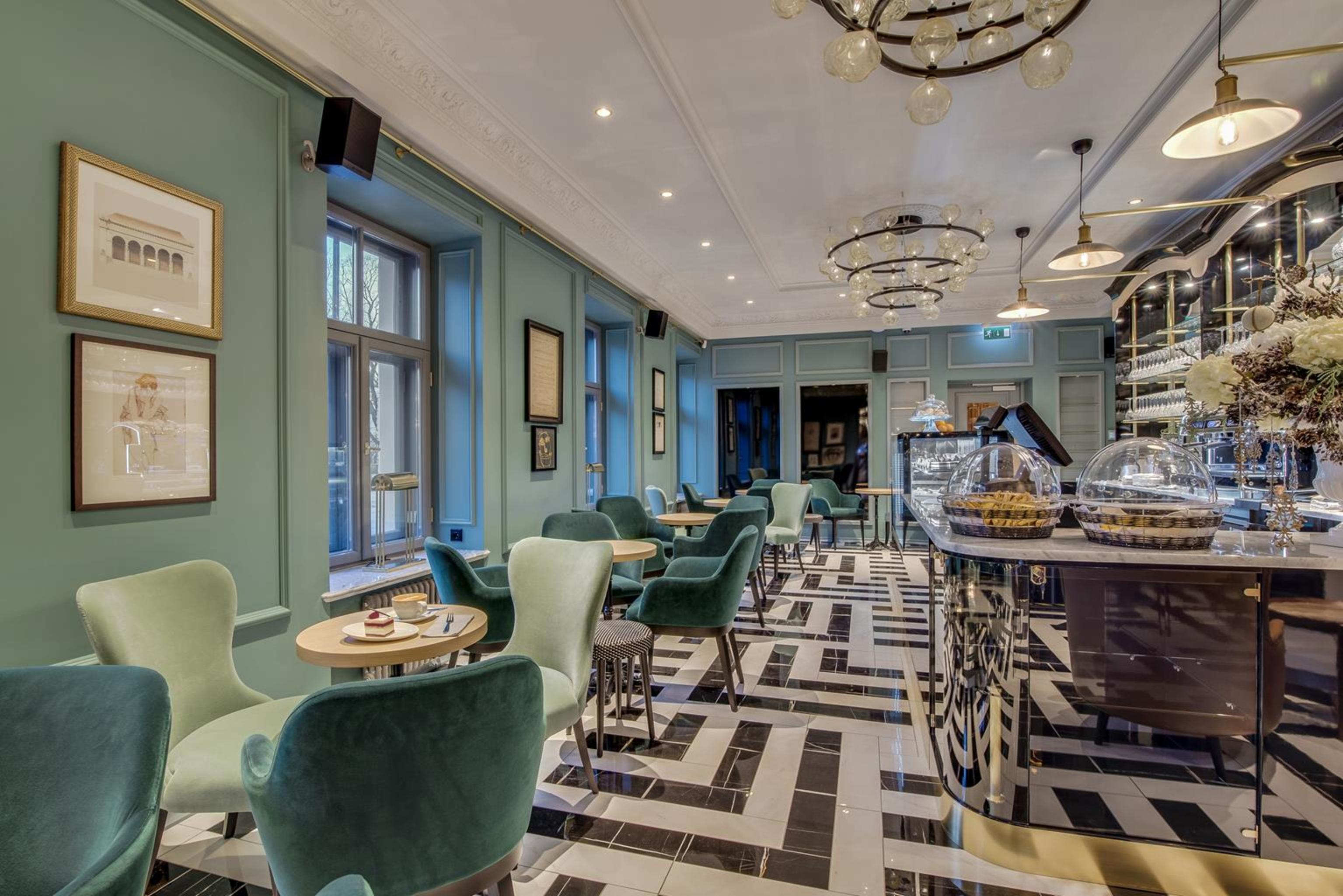 Grand Poet Hotel And Spa By Semarah Riga Bagian luar foto The interior of the restaurant