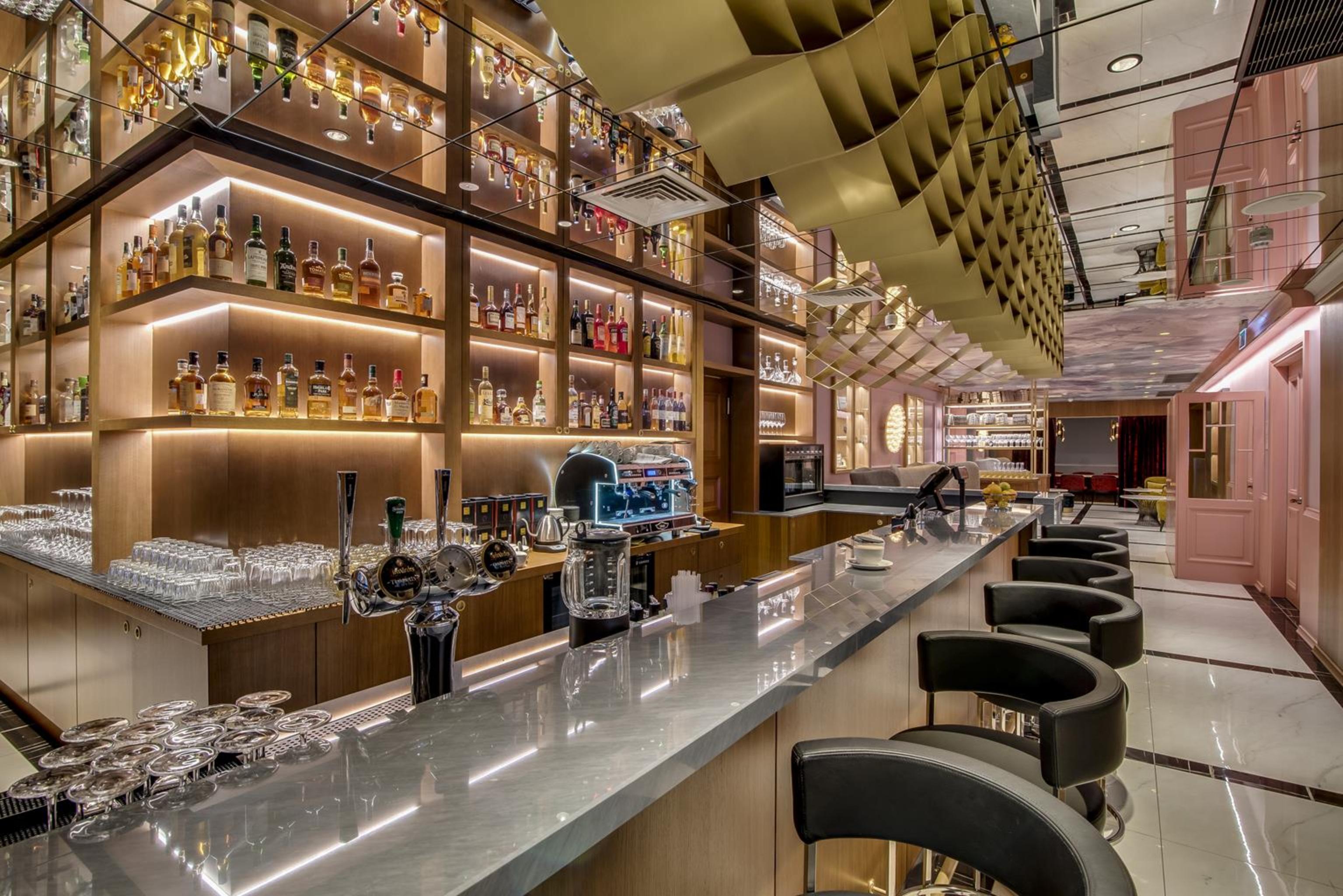 Grand Poet Hotel And Spa By Semarah Riga Bagian luar foto The bar at the 1907