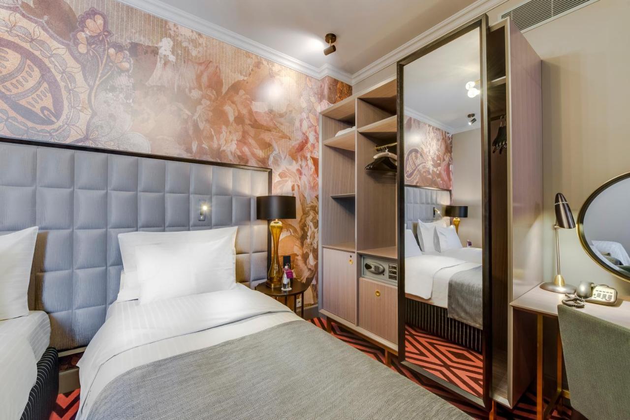 Grand Poet Hotel And Spa By Semarah Riga Ruang foto