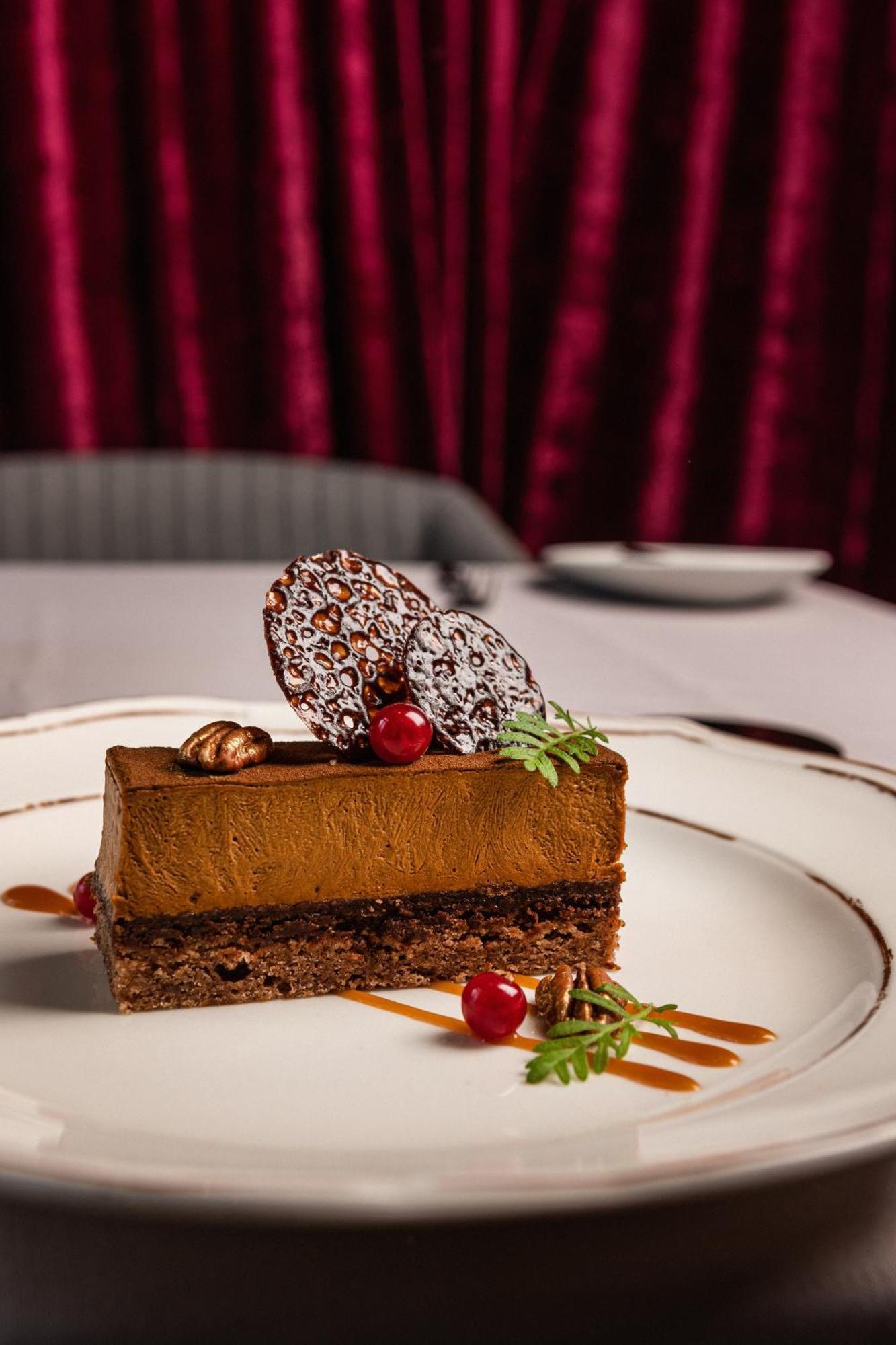 Grand Poet Hotel And Spa By Semarah Riga Bagian luar foto A chocolate dessert