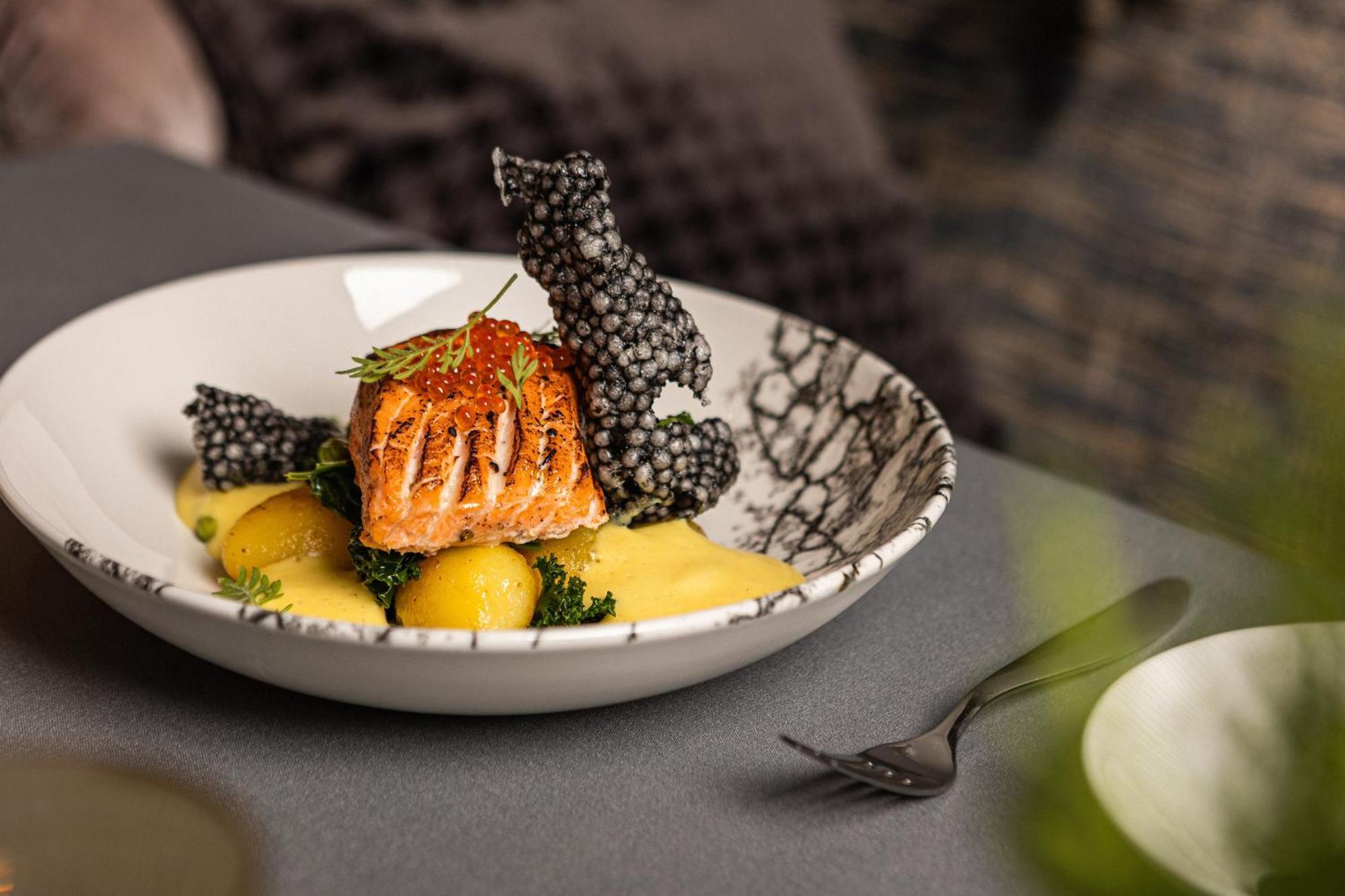 Grand Poet Hotel And Spa By Semarah Riga Bagian luar foto Salmon with blackberries