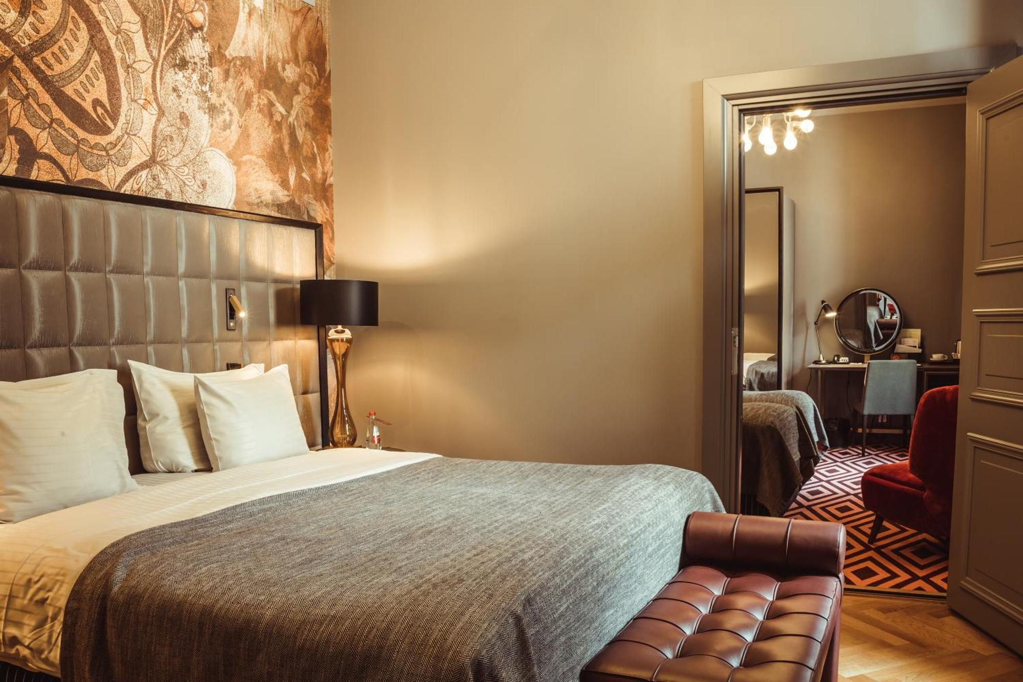 Grand Poet Hotel And Spa By Semarah Riga Ruang foto Suite
