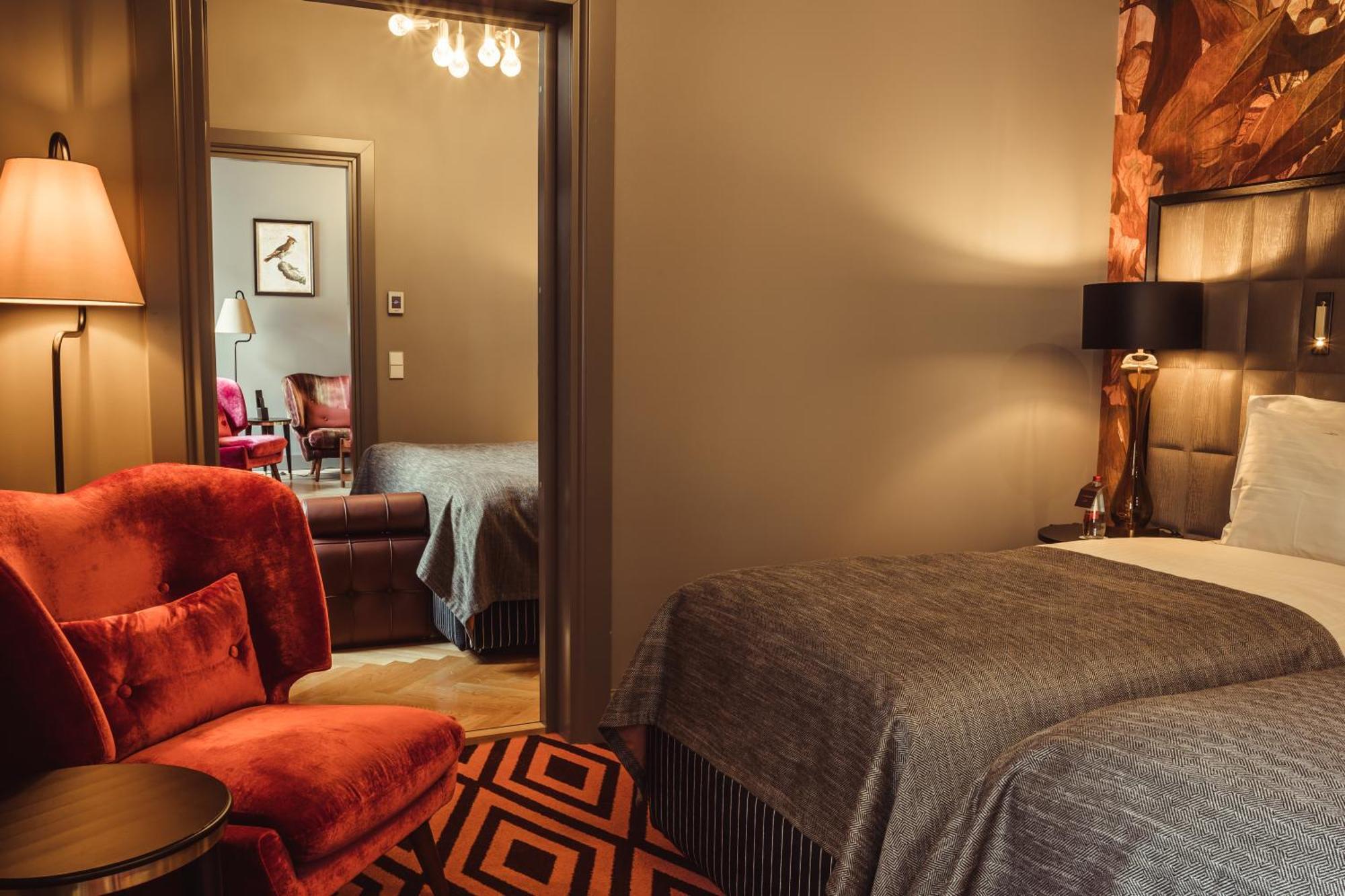 Grand Poet Hotel And Spa By Semarah Riga Bagian luar foto A room at the hotel
